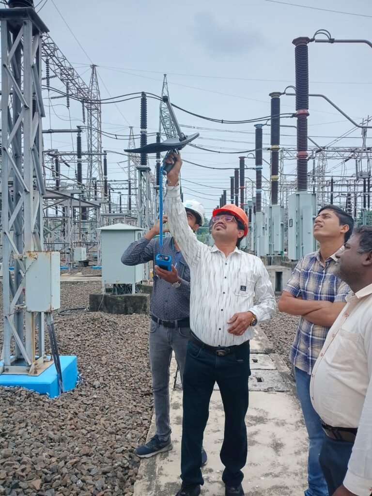 Engineer using SDT LeakChecker for compressed air leak detection